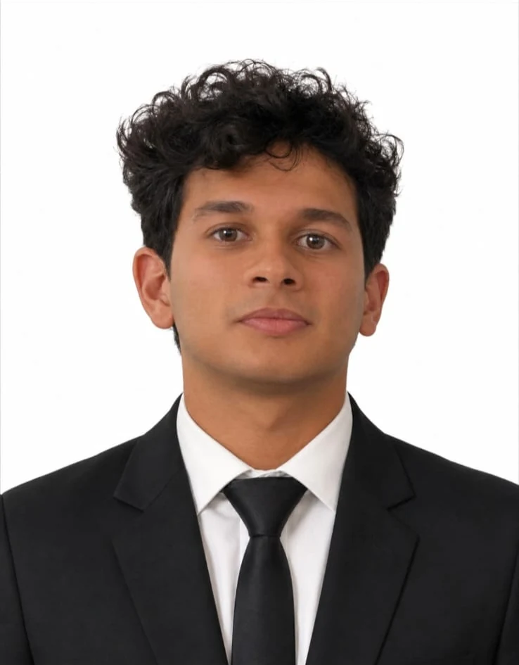 Portrait of Keenan Pereira in a suit and tie